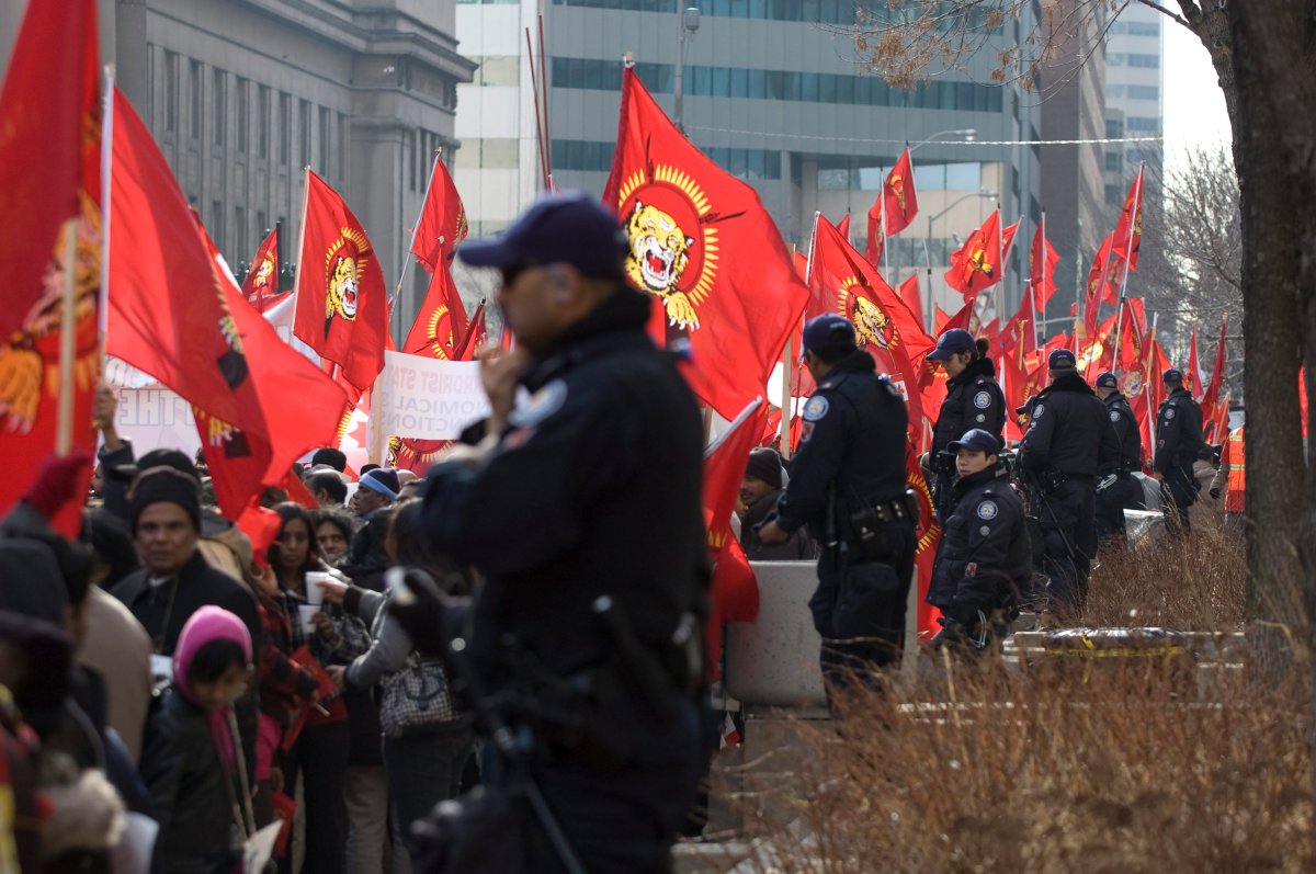 Demonstrators carry Tamil Tigers flags in downtown Toronto on Monday, March 16, 2009. 
