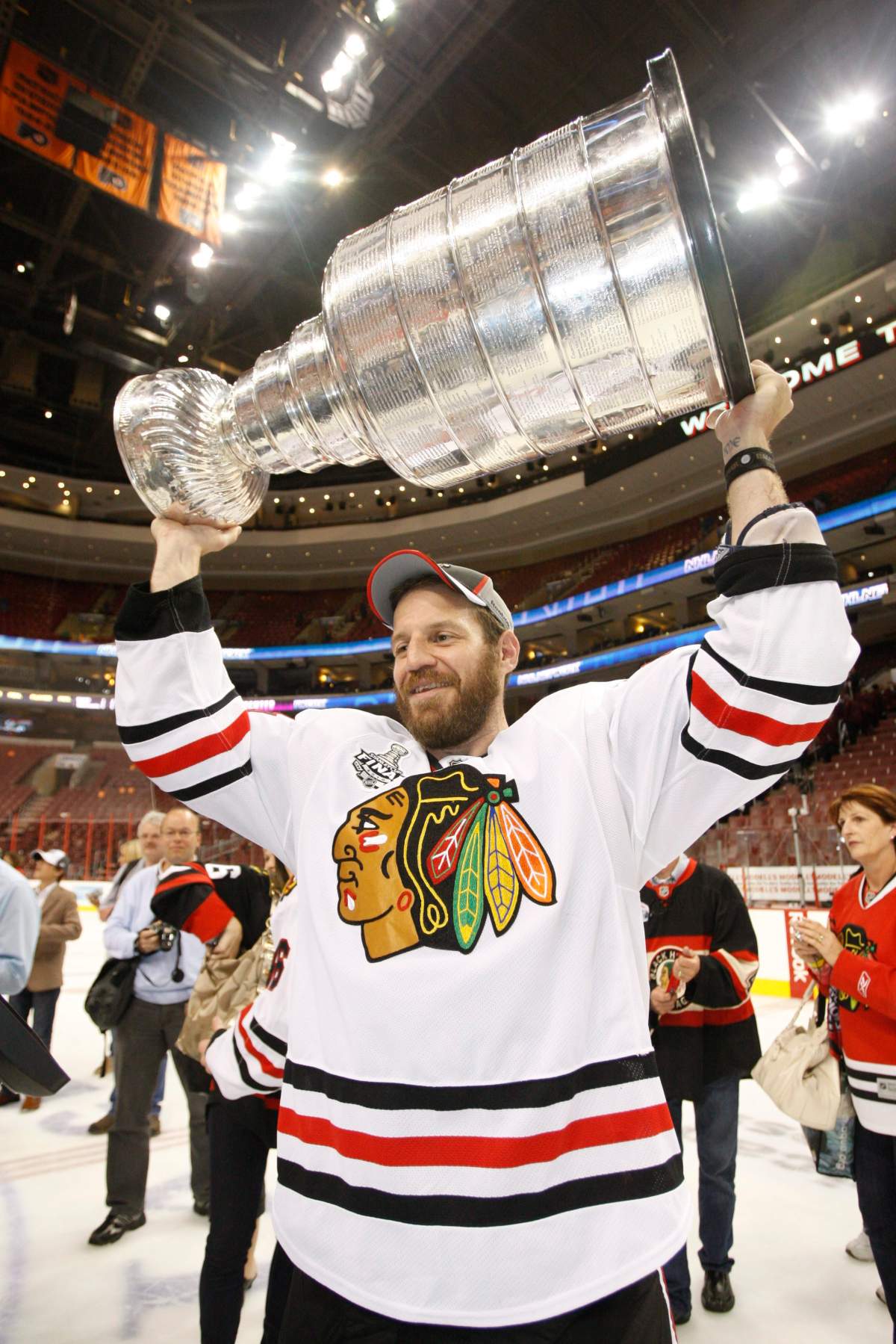 In this June 9, 2010, file photo, Nick Boynton lifts the Stanley Cup after the Chicago Blackhawks beat the Philadelphia Flyers in Game 6 of the NHL Stanley Cup hockey finals.