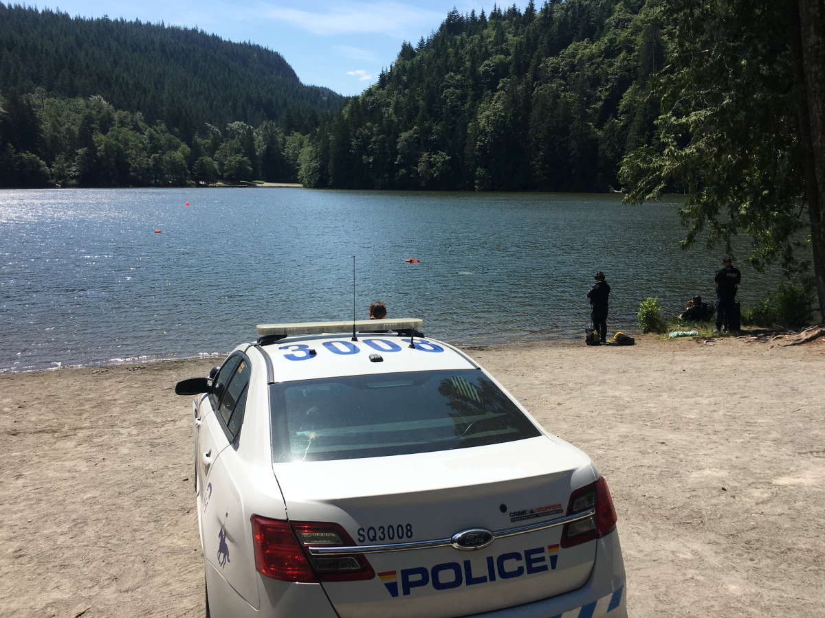 Image of an RCMP cruiser on the scene at Alice Lake, where a man's body was found on June 21, 2018.