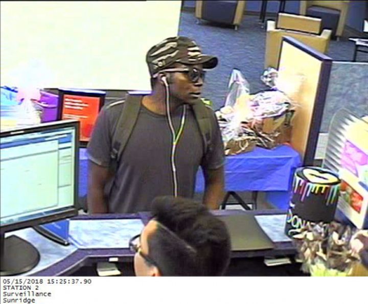 Police are seeking a man in connection to a bank robbery on May 15.