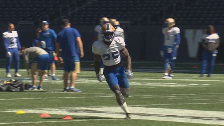 Winnipeg Blue Bombers running back Johnny Augustine takes part in drills at training camp.