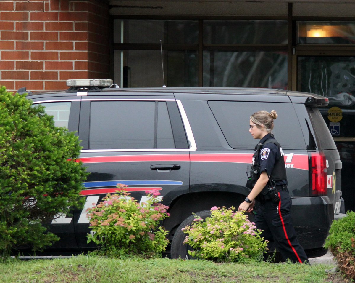 A photo from the Twitter account @DickieBuckshot shows Belleville police outside of 179 Palmer Rd. Police say this was one location where raids took place Thursday morning.