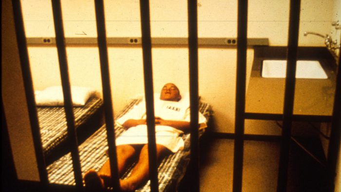 A prisoner is shown in his cell during the Stanford Prison Experiment in 1971.