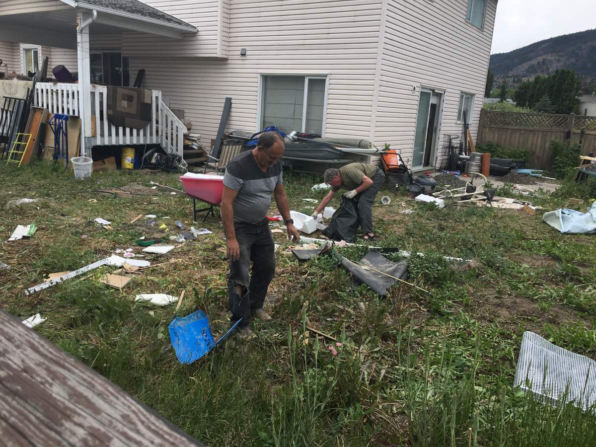 Residents in West Kelowna neighborhood elated neighbour’s unsightly yard finally getting cleaned up - image