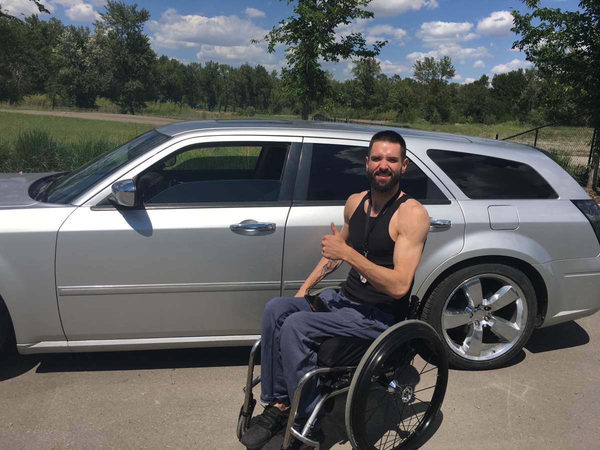 Dalten Campbell, reunited with his specially-modified car.