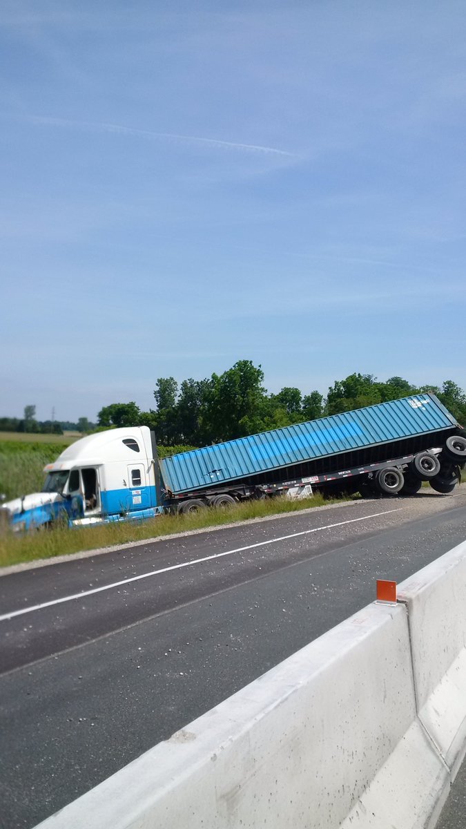 A transport truck lost control and landed in a ditch on the 401 westbound, near Victoria Road on Tuesday morning. 