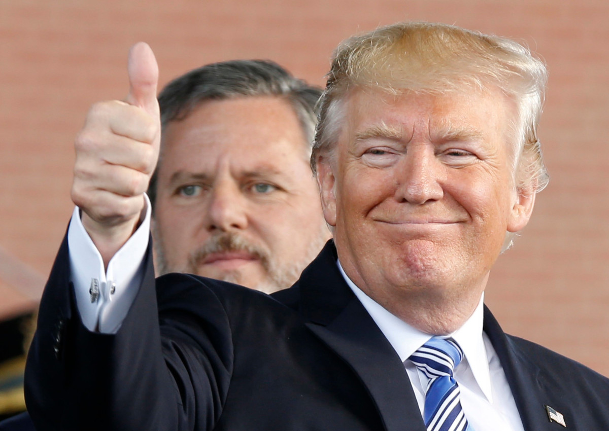 In this May 13, 2017 file photo, President Donald Trump, right, gives a thumbs up.