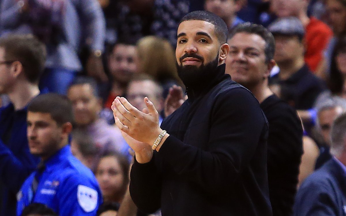 Drake applauds during the second half of an NBA game between the Philadelphia 76ers and the Toronto Raptors at Air Canada Centre on Oct. 21, 2017 in Toronto, Canada.  