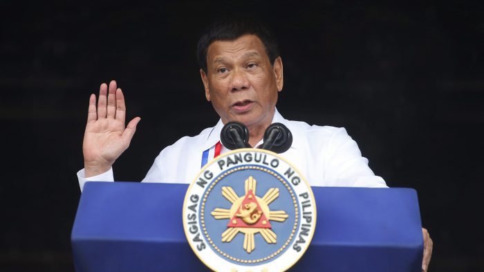 In this Tuesday, June 11, 2018, file photo, Philippine President Rodrigo Duterte gestures while addressing the crowd at the 120th Philippine Independence Day celebrations south of Manila, Philippines. 