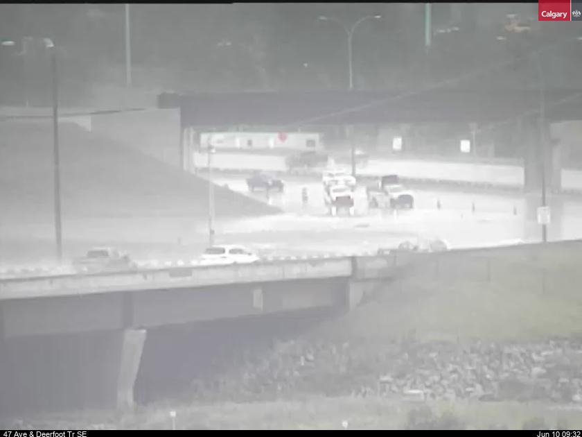 Deerfoot Trail reopens approaching Calfrobe Bridge SE after the road flooded Sunday morning.