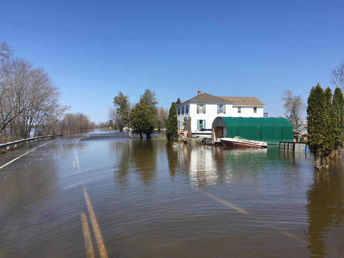 Floodwater surrounded homes along Route 105 in Maugerville, N.B, on May 9.