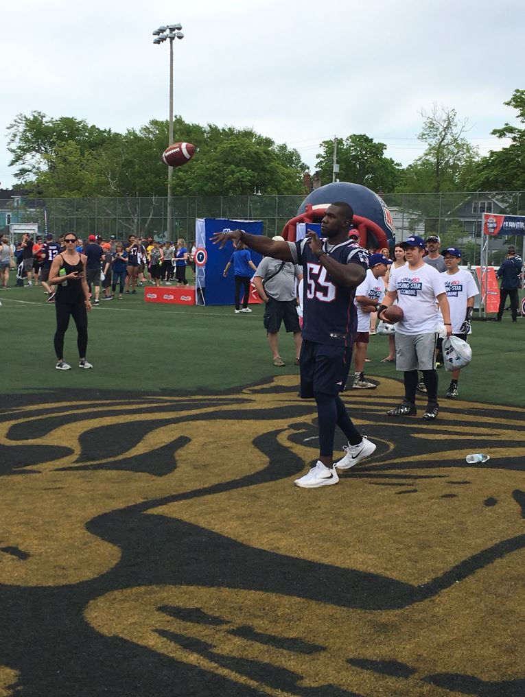 New England Patriot's Eric Lee throws a pass during the NFL PLAY 60 combine in Halifax on Saturday, June 16, 2018. 
