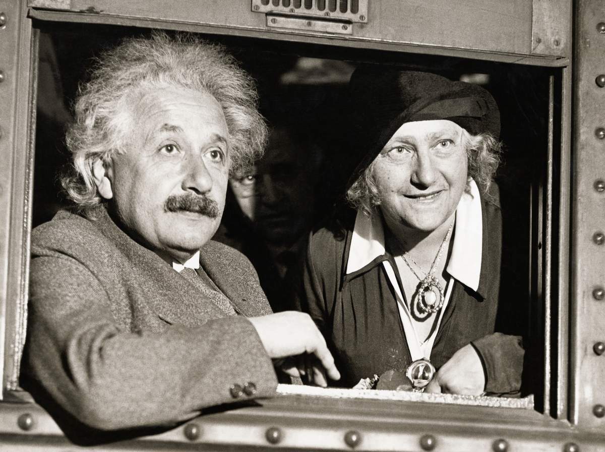 Physicist Albert Einstein (1879-1955) with his wife Elsa in Chicago. 