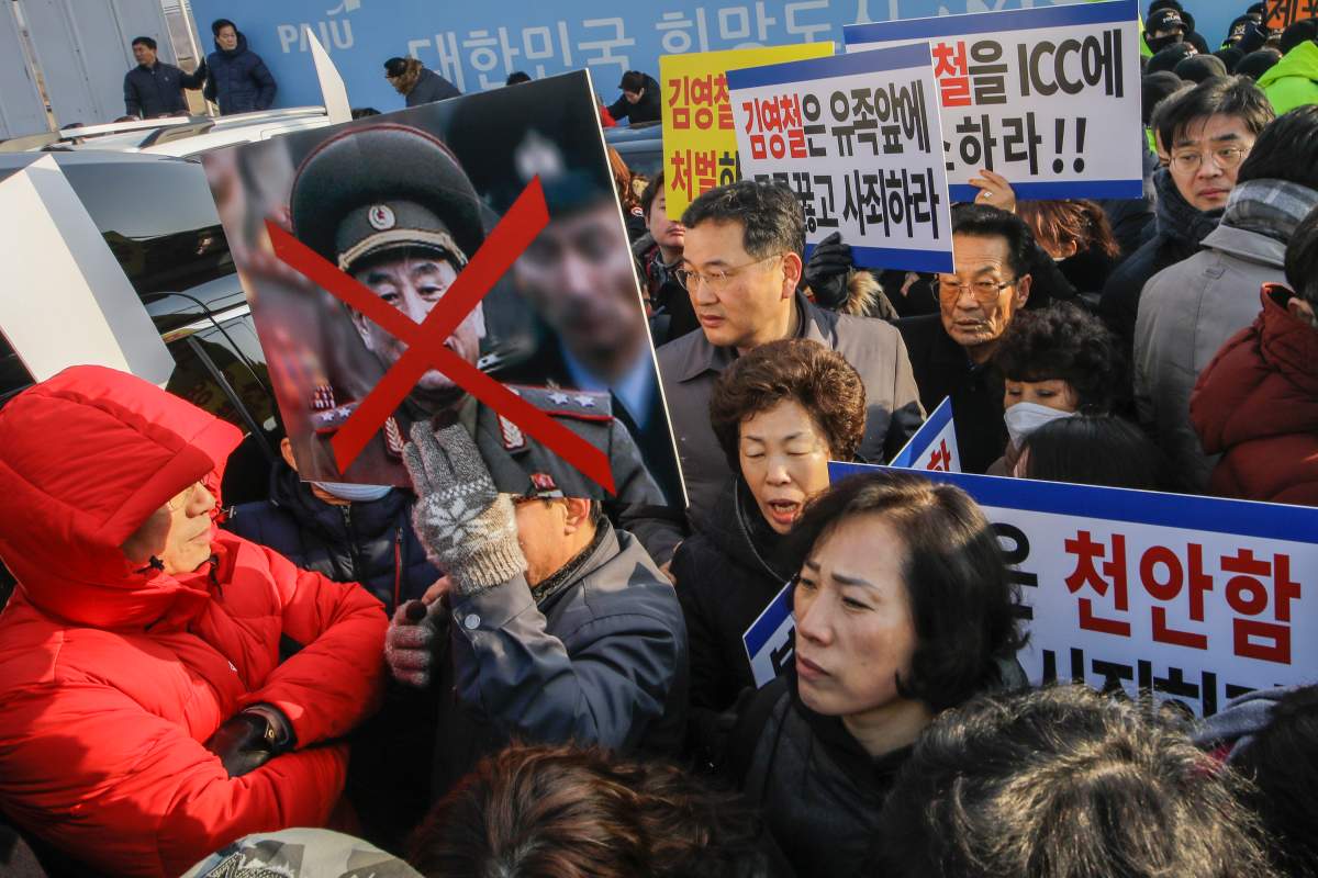 South Korean Nay sunken ship Cheonan victims family members rally against North Korean vice chairman Kim Yong Chol visit near the Unification Bridge near Panmunjom in Paju, South Korea, on 25 February 2018.