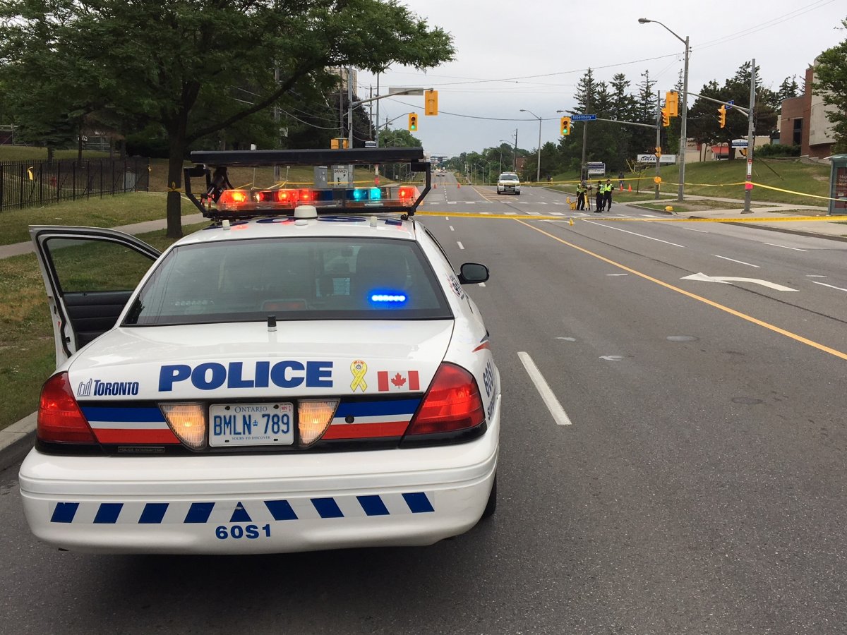 Officers investigate the scene of a hit and run in North York.