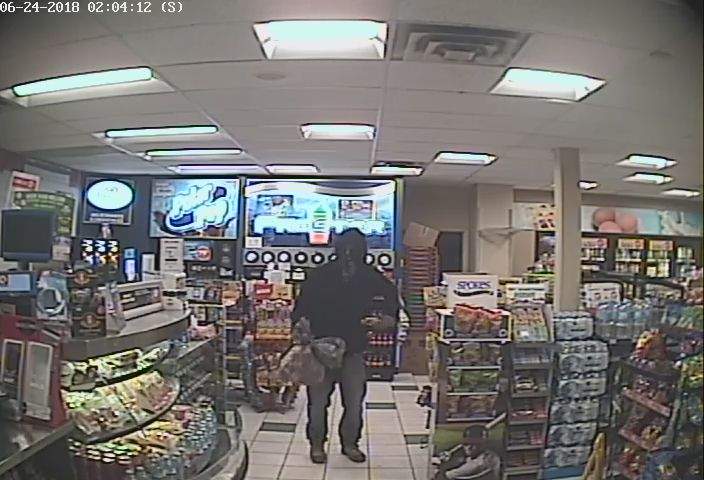 Police are searching for a man (above) in his late 30s accused of robbing a gas station in Huntsville.