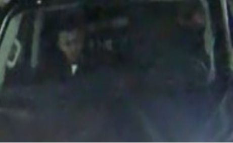 An IHIT-provided surveillance image of one of two persons of interest associated with the black Nissan Titan.