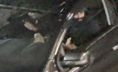 An IHIT-provided surveillance image of one of two persons of interest associated with the black Nissan Titan.