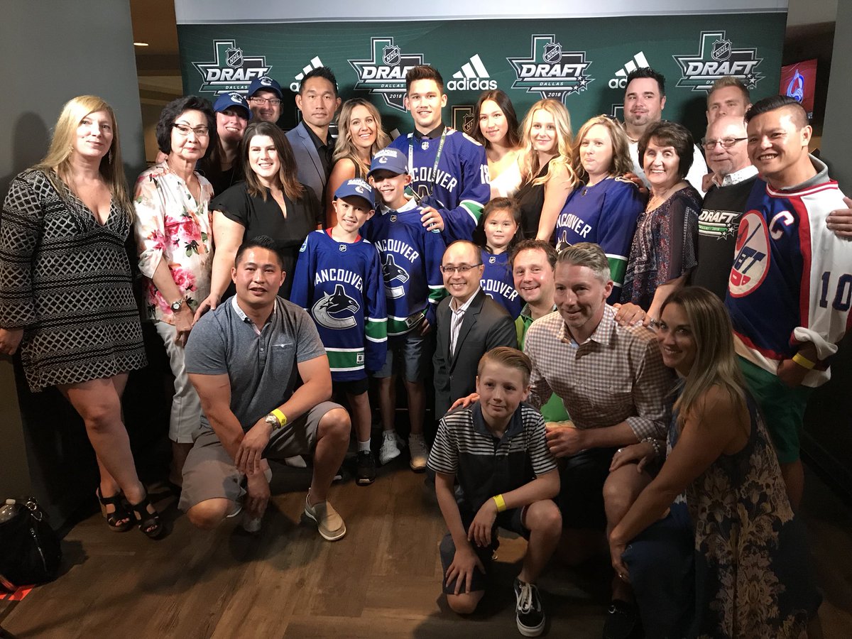 Jett Woo and his family pose for a photo after his selection 37th overall in the 2018 NHL Draft.