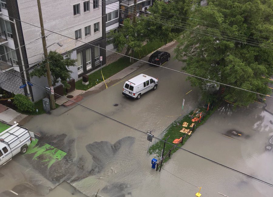 Two stretches of road in downtown Ottawa remain closed after a water main break caused flooding in the area, as well as a small sinkhole at one intersection.