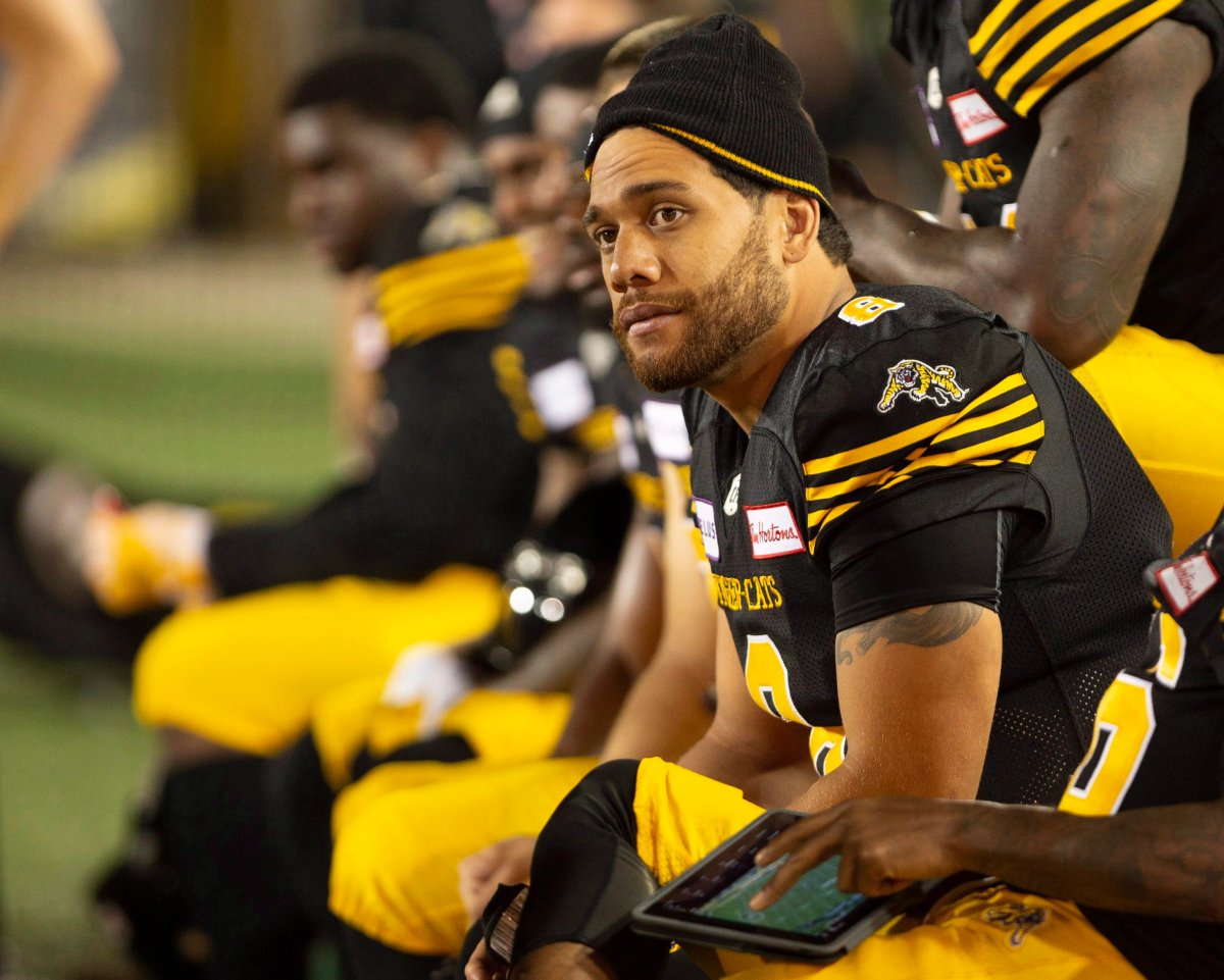 Hamilton Tiger-Cats quarterback Jeremiah Masoli (8) sits on the bench during the second half of CFL Football exhibition game action against the Toronto Argonauts in Hamilton, Ont. on Friday, June 1, 2018.