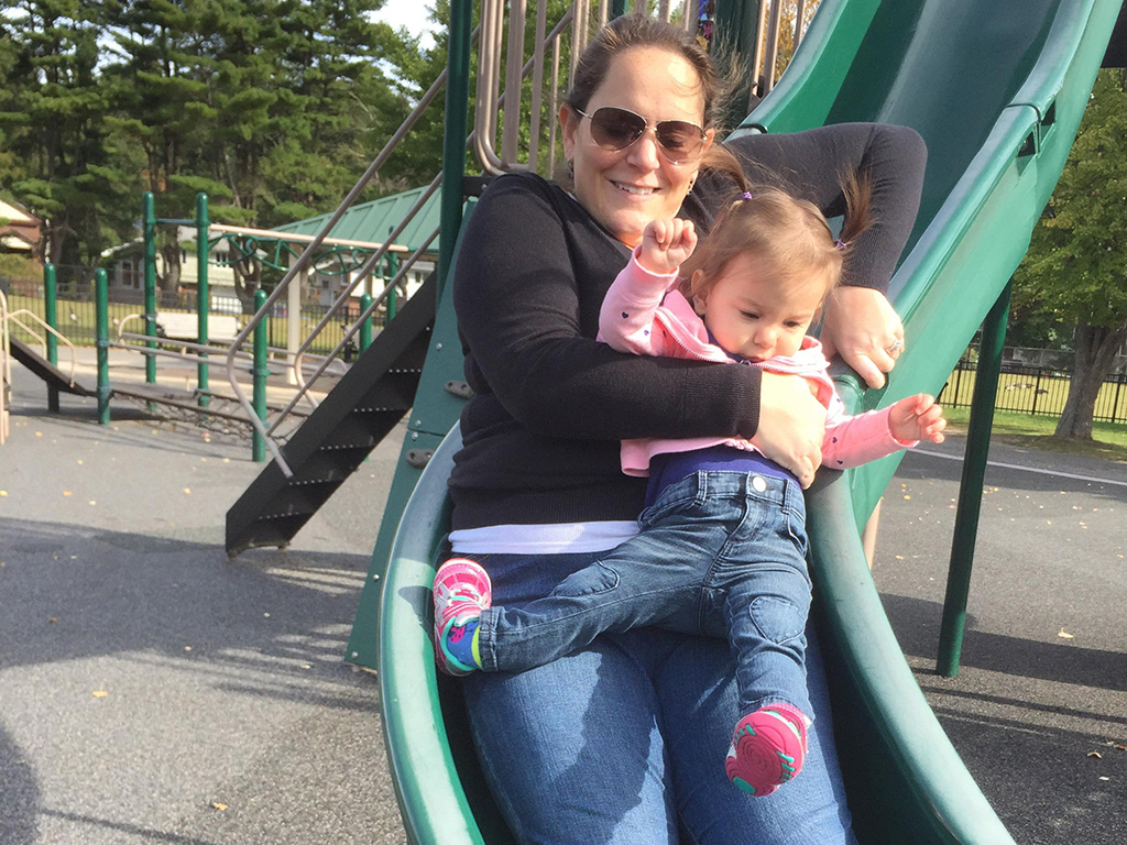The one-year-old tot broke her leg in 2015 when she went down a slide on her mom's lap. 