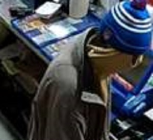 Police are looking for a male suspect who used a yellow hoodie to disguise his face while robbing a convenience store in Ottawa's Pineview neighbourhood early Thursday morning.