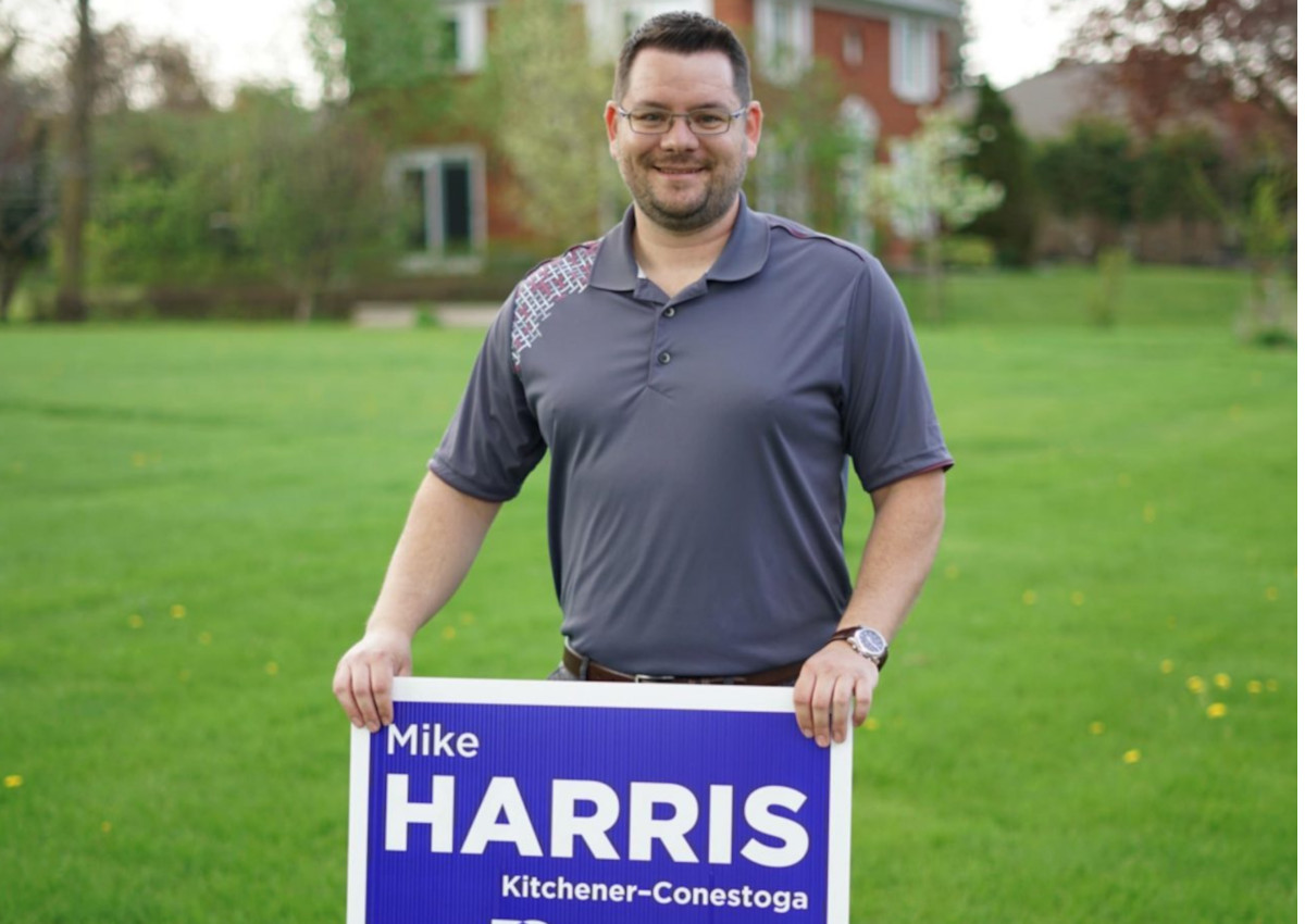 Mike Harris Jr. plants his first sign.