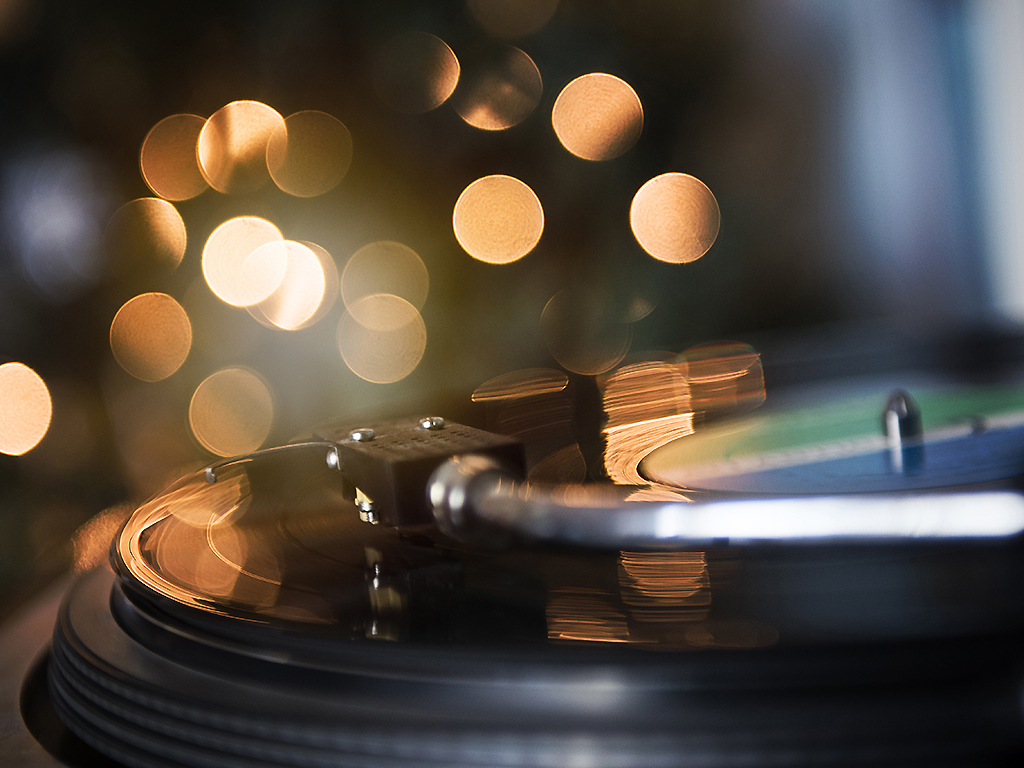 A close-up of a spinning record player.