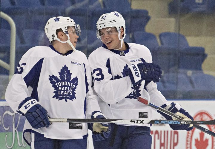 Toronto Maple Leafs first round draft pick Auston Matthews, right, chats with fellow prospect Nolan Vesey between drills as the Leafs hold their development camp in Niagara Falls, Ont., Tuesday, July 5, 2016. 