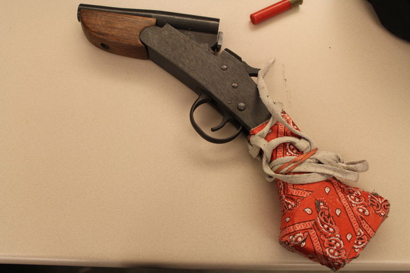 Photograph of a gun seized by police during search warrant in Toronto on June 9, 2018.