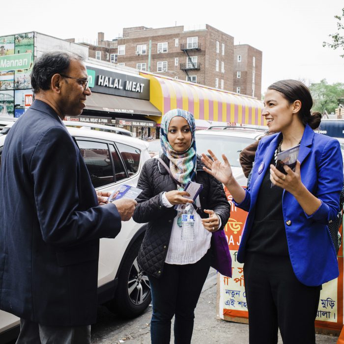 This May 6, 2018 photo shows candidate Alexandria Ocasio-Cortez, right, during a Bengali community outreach in New York.