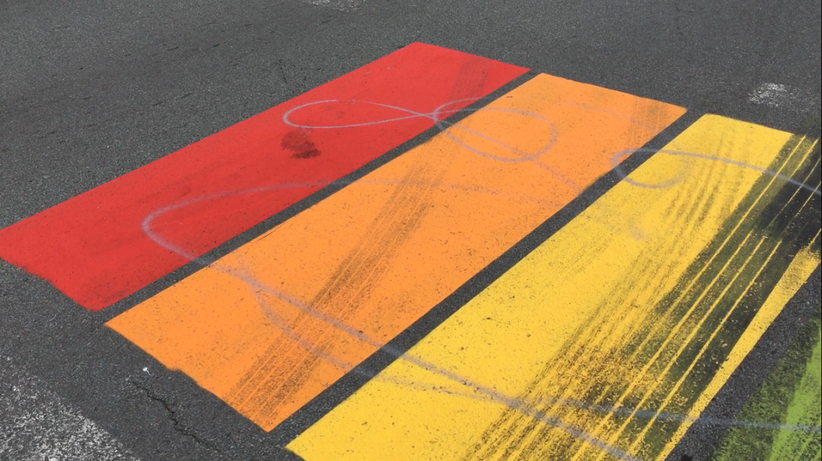 A rainbow crosswalk, which was installed two weeks ago near Quigley Corner in Eastern Passage, N.S., has already been the target of vandalism.