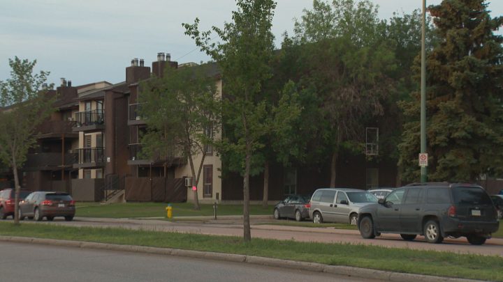 A woman was shot in the hand Monday evening while standing on a balcony at an apartment building in Saskatoon.