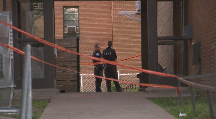 Police investigate after gunshots were fired at Place de la Colombière in Ahuntsic on Saturday, June 2, 2016.