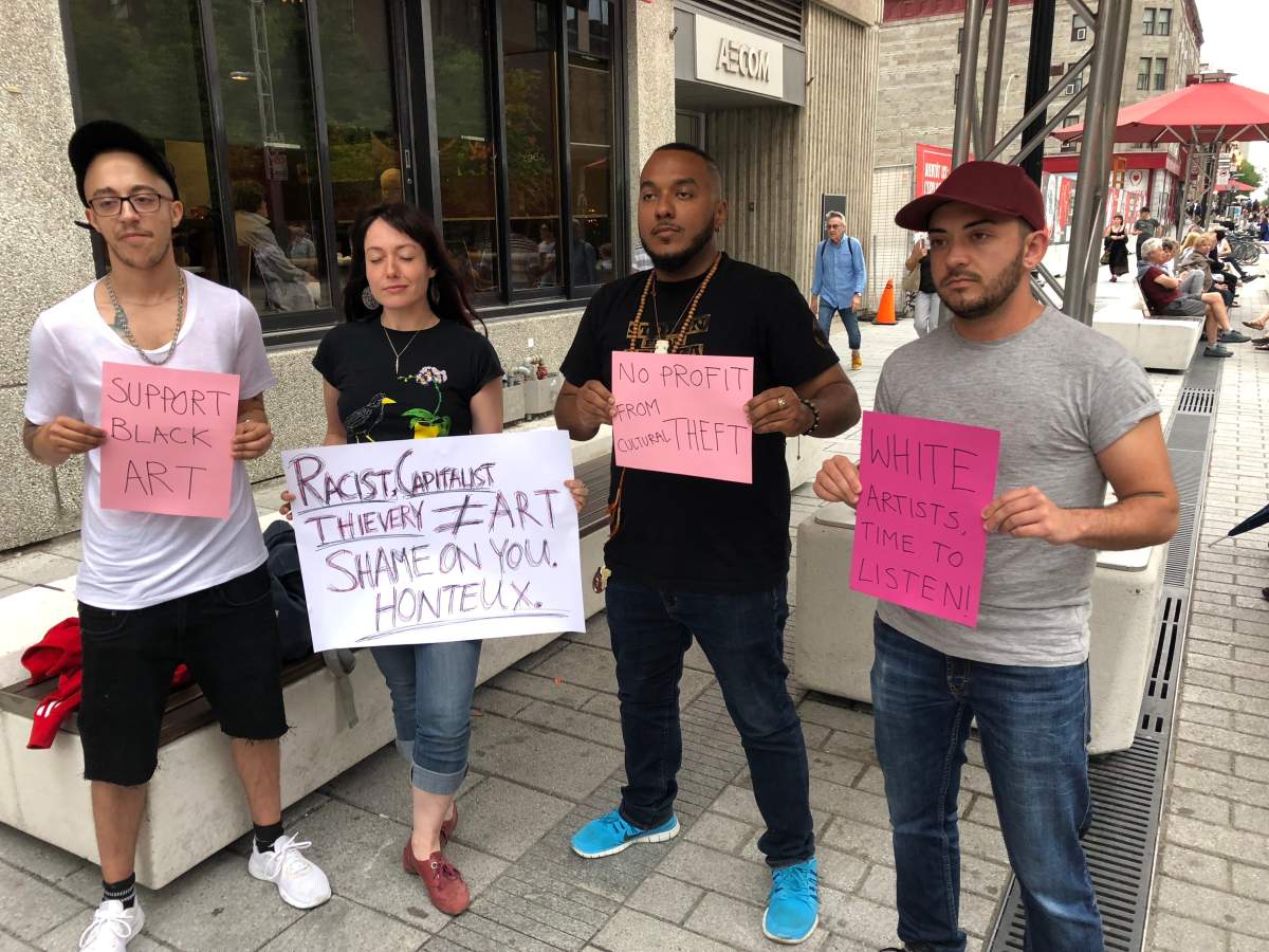Protesters in front of the Theatre du Nouveau Monde in Montreal. Wednesday June 27, 2018.