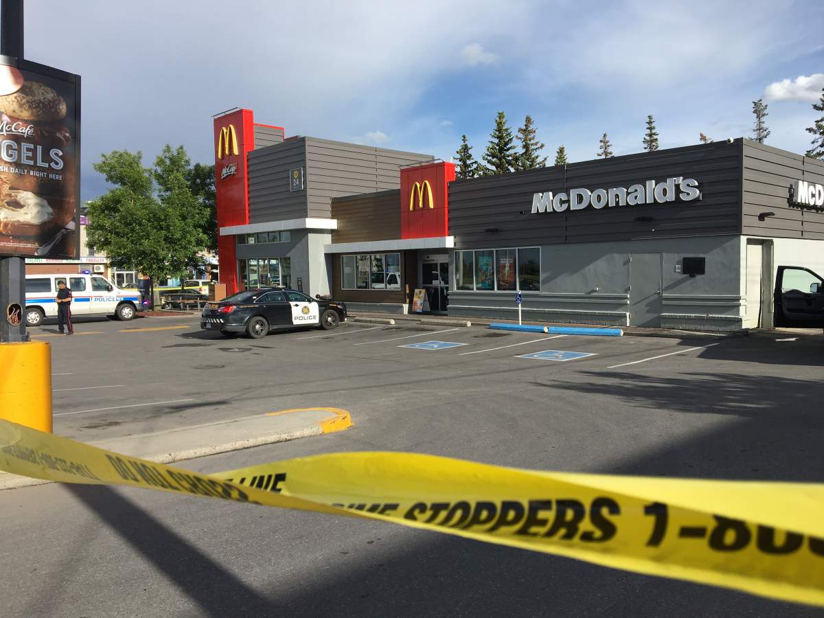 Police at the scene of a stabbing in Calgary's southwest. 