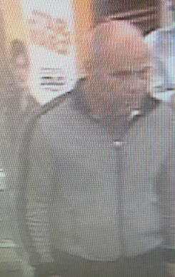 Barrie police are seeking the public’s assistance identifying a suspect (above) in connection with a theft from Walmart.