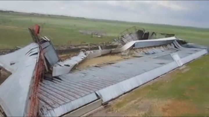A damaged hay barn in Tilley, Alberta Saturday June 9, 2018.