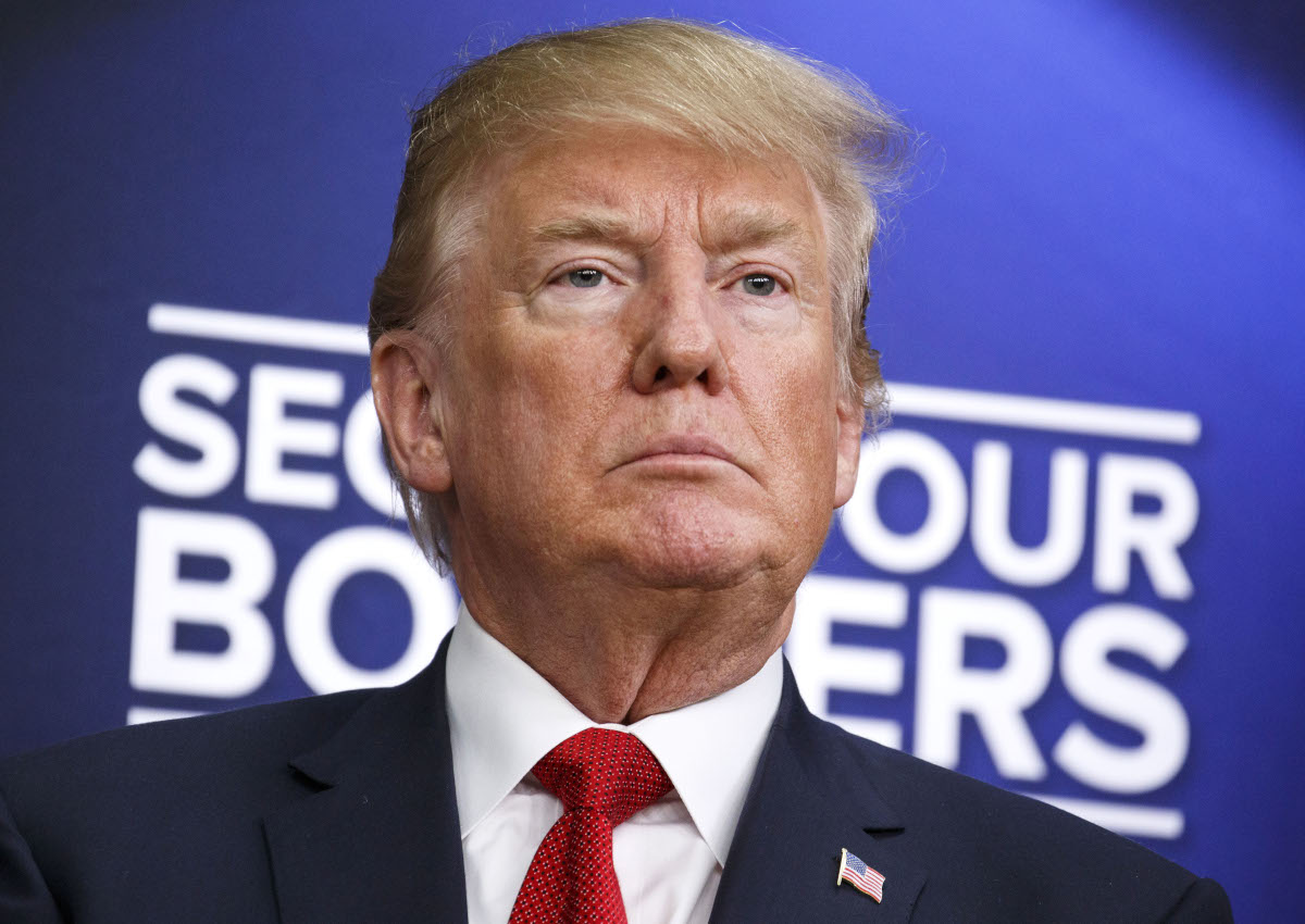 FILE - Donald Trump listens during an event with families who have lost relatives to crimes caused by illegal immigrants at the Eisenhower Executive Office Building in Washington, D.C., U.S. on Friday, June 22, 2018.