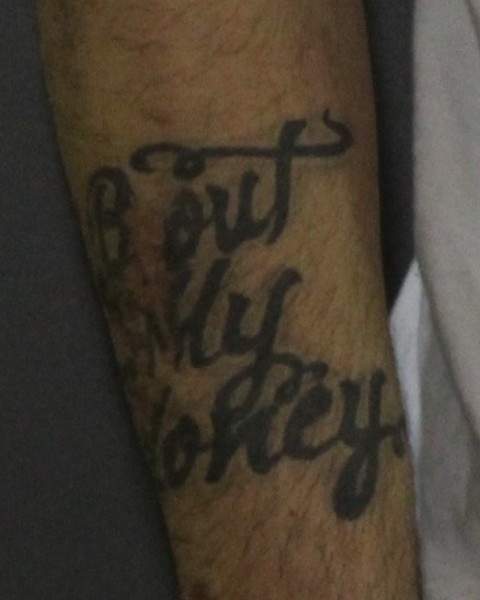 The right forearm of Tyson Darryl Cole.