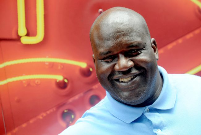 Former NBA Player Shaquille O'Neal pictured handing out donuts from a Krispy Kreme truck to celebrate their 80th anniversary in Times Square, New York City, NY, USA on July 13, 2017. 

