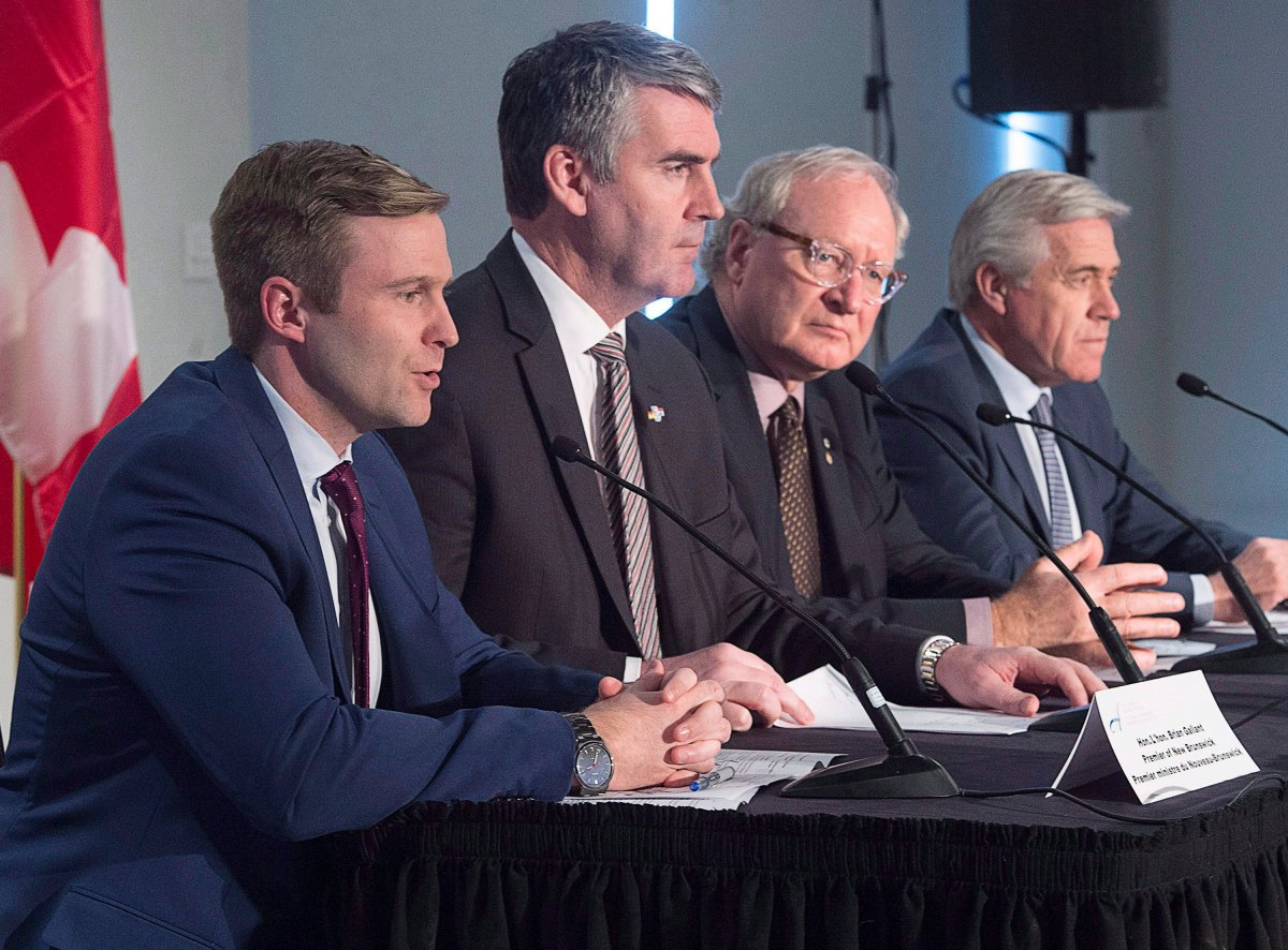 FILE - New Brunswick Premier Brian Gallant, Nova Scotia Premier Stephen McNeil, Prince Edward Island Premier Wade MacLauchlan, and Newfoundland and Labrador Premier Dwight Ball, left to right, hold a news conference at the end of a meeting of Atlantic Premiers in Halifax on Monday, Dec. 11, 2017. 