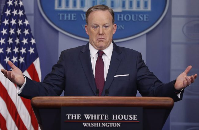 Then-White House press secretary Sean Spicer gestures while speaking to the media in the Brady Press Briefing Room of the White House in Washington, March 24, 2017.

