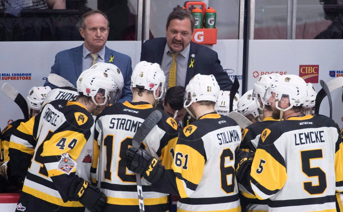 OHL Hamilton Bulldogs head coach John Gruden speaks to his team during third period Memorial Cup semifinal action against the Regina Pats in Regina on Friday, May, 25, 2018. 