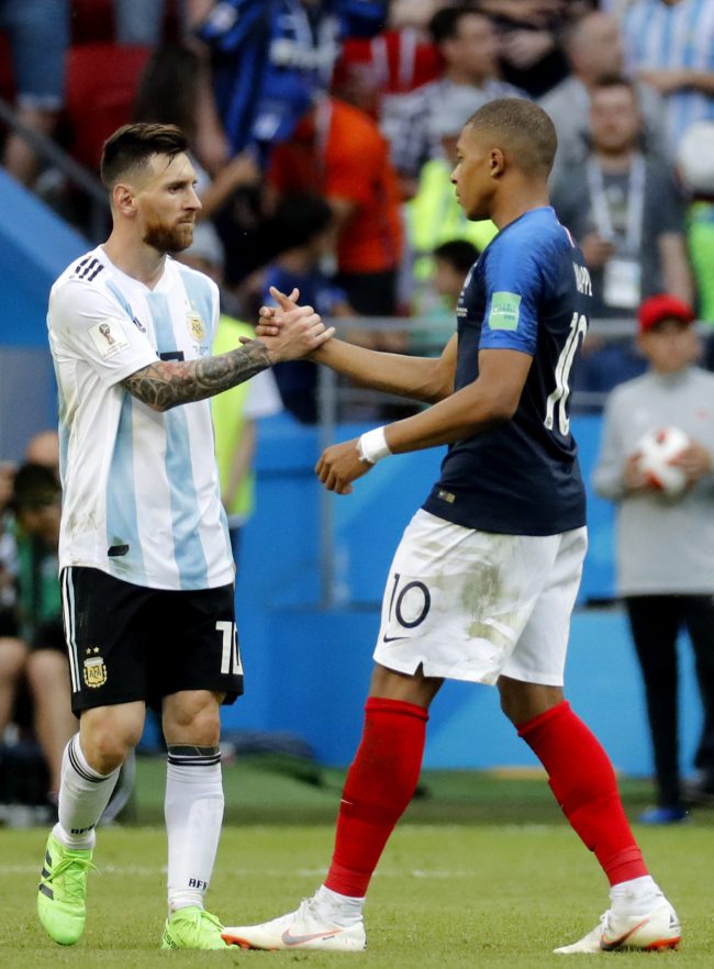 Lionel Messi (L) of Argentina shakes hands with Kylian Mbappe of France after the FIFA World Cup 2018 round of 16 soccer match between France and Argentina in Kazan, Russia, 30 June 2018.