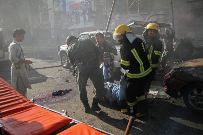 Emergency personnel remove a body at the site of a deadly suicide attack in Jalalabad, Afghanistan Thursday, June 7, 2018.
(.
