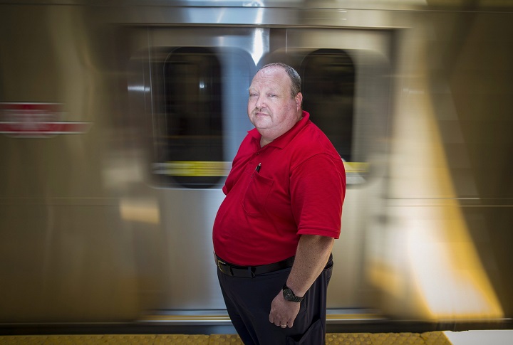 Kevin Freeman, a volunteer with the TTC's peer support program, poses for a photo at Wilson Station in Toronto on Thursday, July 5, 2018. 