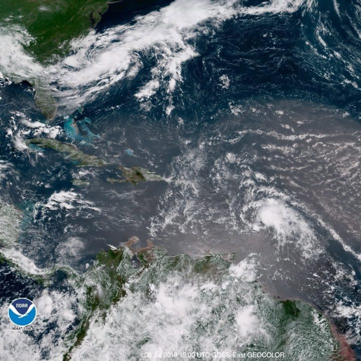 In this geocolor image GOES-16 satellite image taken Sunday, July 8, 2018, at 15:00 UTC, shows Tropical Storm Beryl, center right, moving across the Lesser Antilles in the eastern Caribbean Sea, and Tropical Storm Chris, top left, off the U.S. East Coast. 