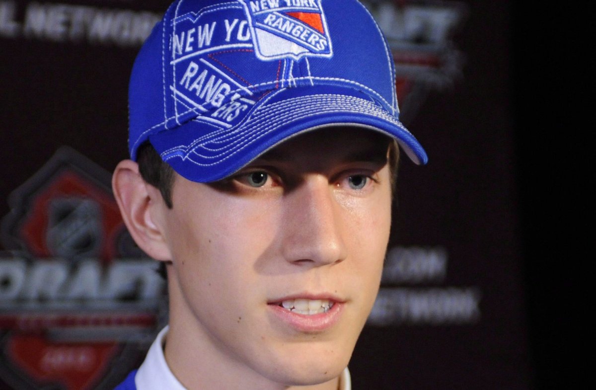 Adam Tambellini talks to the media after the New York Rangers selected him 4th in the third round of the NHL hockey draft, Sunday, June 30, 2013, in Newark, N.J. The Ottawa Senators have signed forward Tambellini to a two-way, one-year contract. 